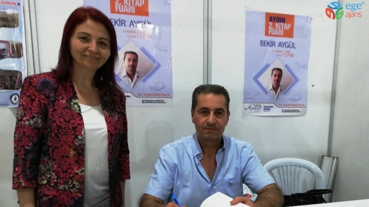 Bekir Aygül, yeni kitabı ‘Çadırın Gözü, Yeniden Doğuş’u okuyucuları için imzaladı