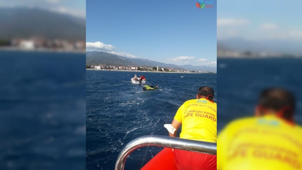 Edremit’te uçurtma sörfü yapan genç ve kurtarmaya gidenleri cankurtaranlar kurtardı