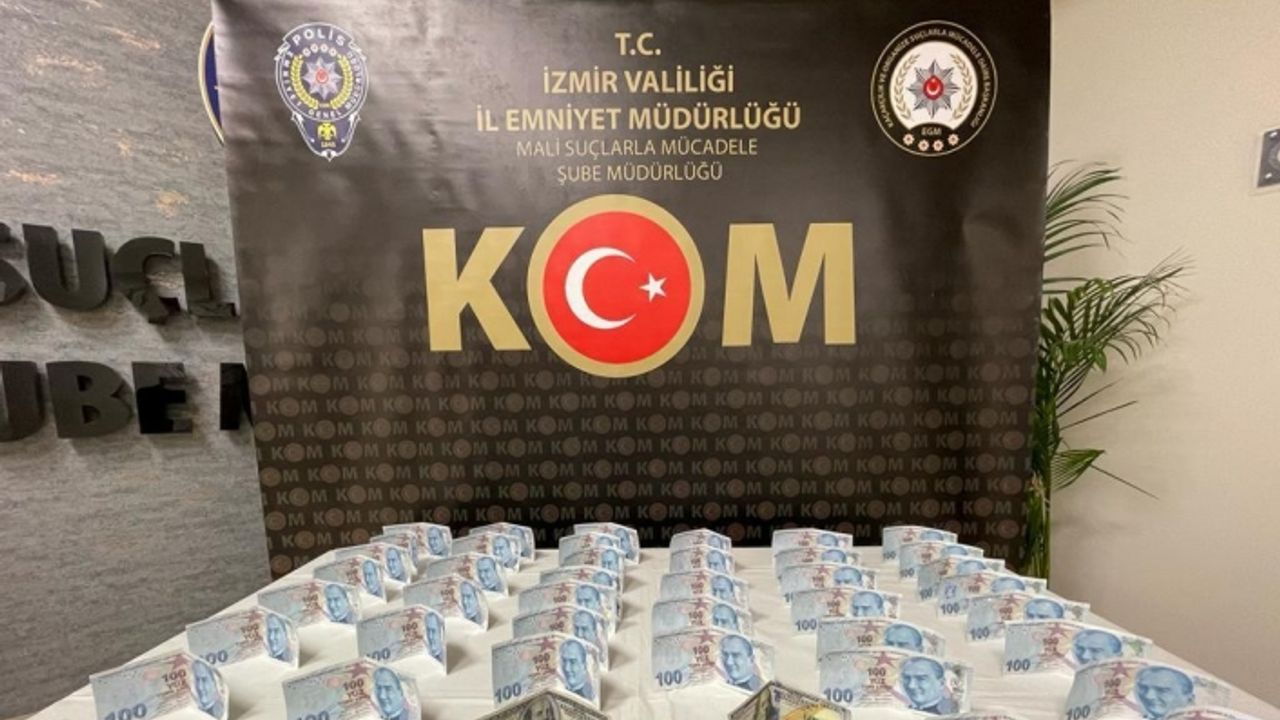 İzmir'de sahte parayla akaryakıt aldıkları belirlenen 2 şüpheli yakalandı